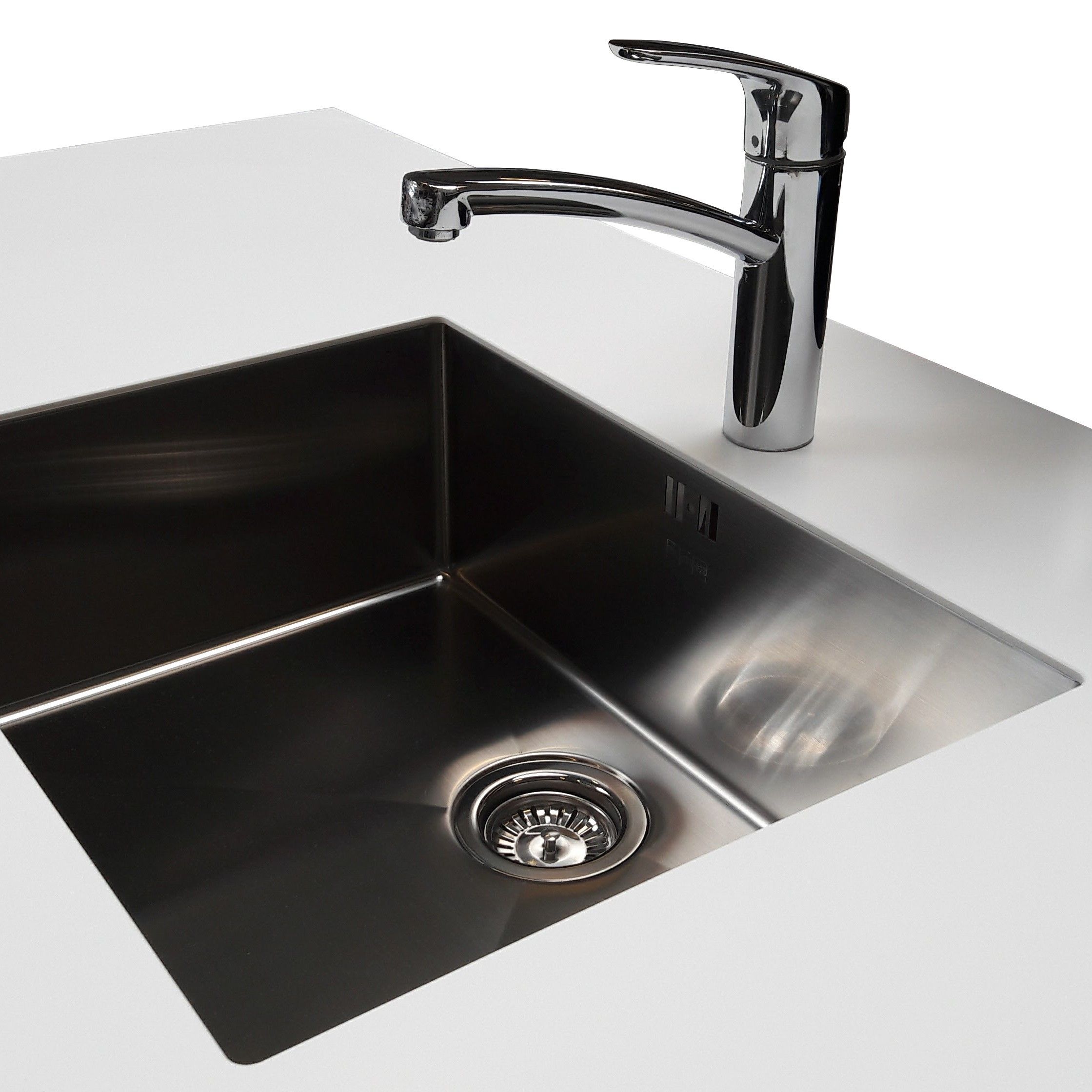 Underfræset vask i Corian bordplade 